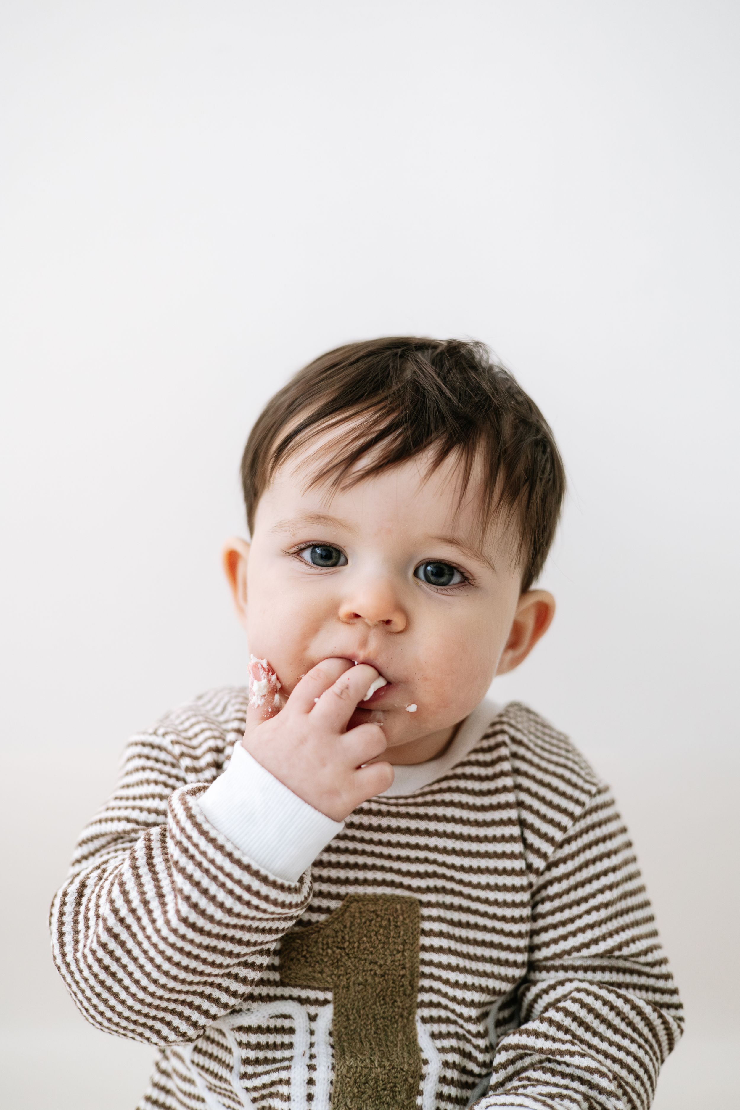 Nottingham cake smash photographer neutral tones simple birthday portrait photos