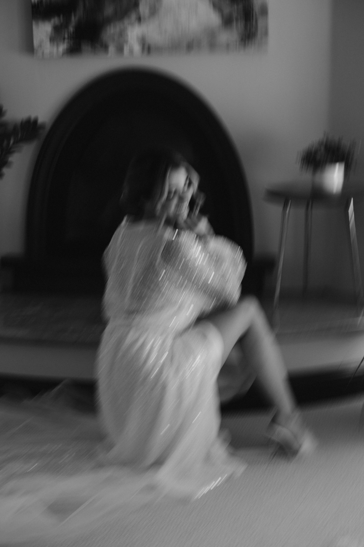 Artistic black and white portrait in dreamy soft focus showing bridal details.