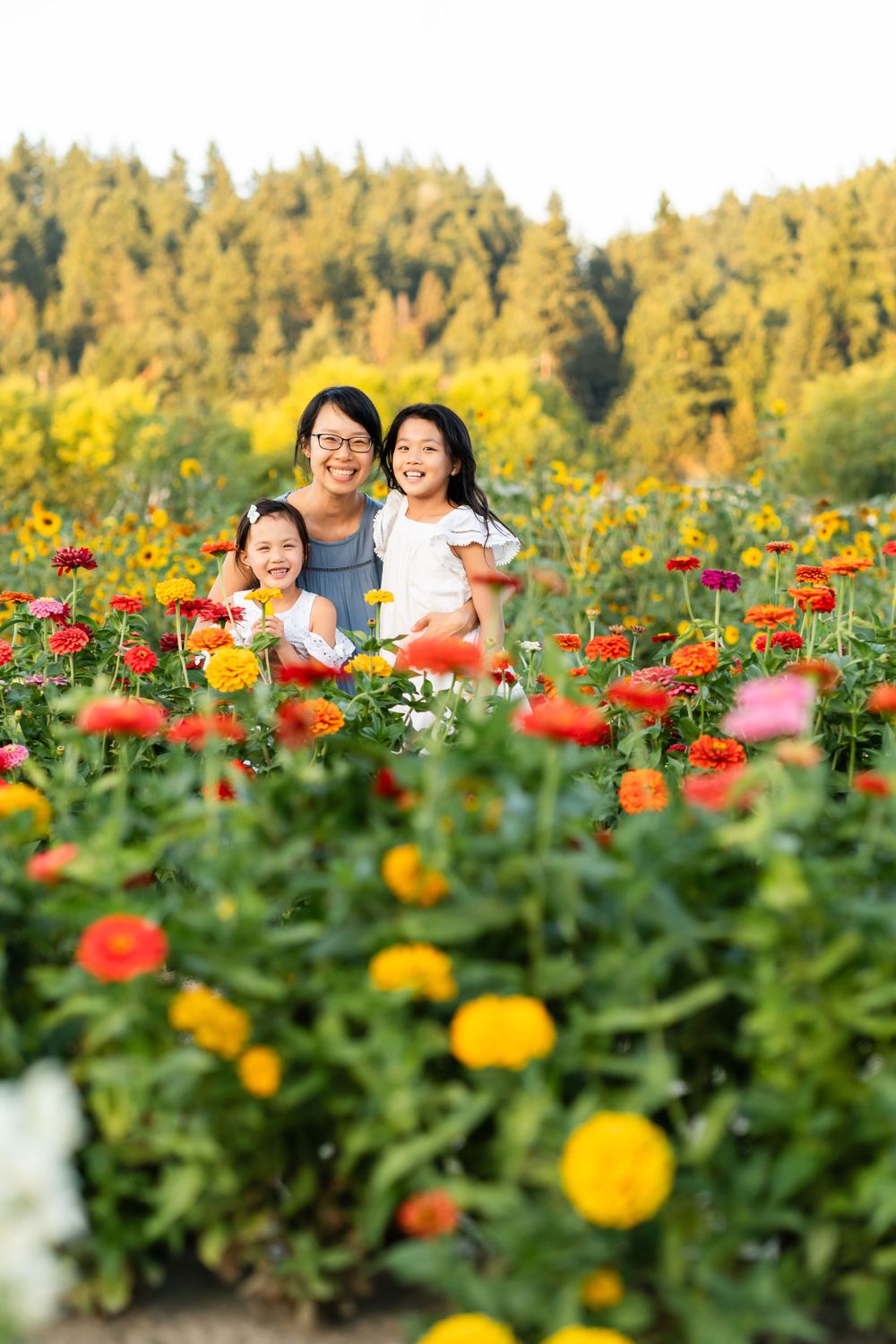 Mother and daughter in a flower field at JB Family Growers.