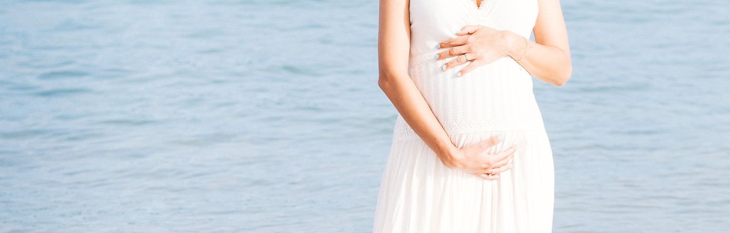 Portrait of a pregnant woman, Natural light. Maternity Photography session. Outdoor photography. pregnancy photography, beach