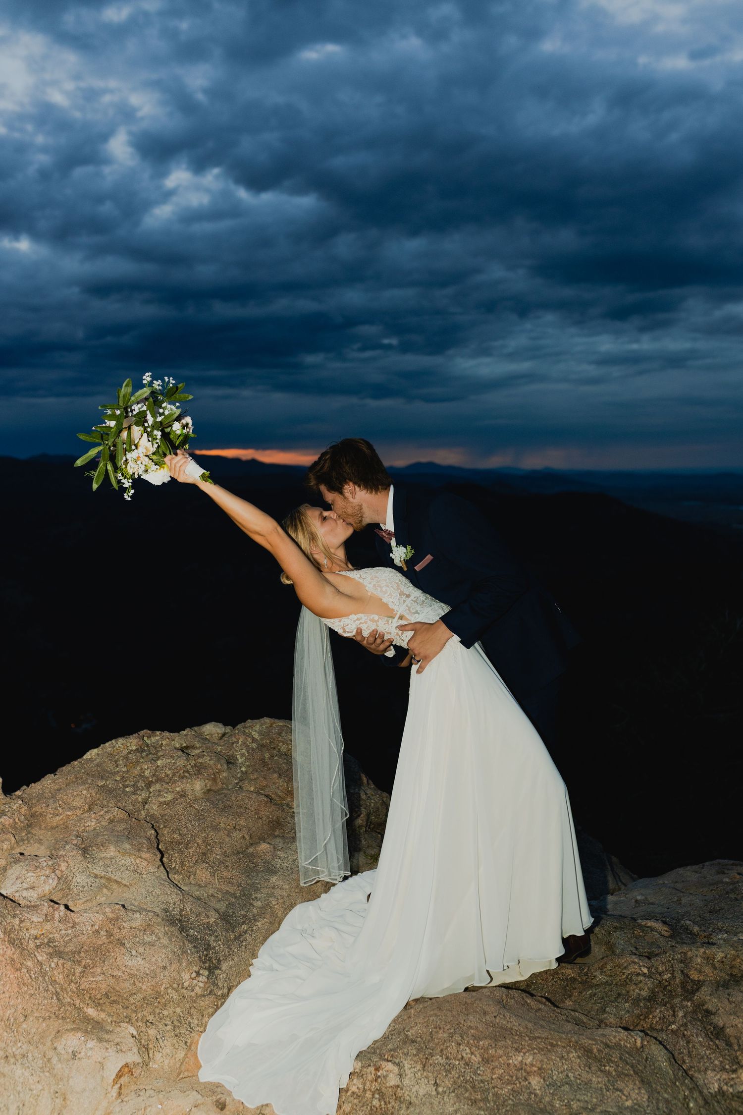bride and groom kissing to celebrate their new marriage in Boulder, Colorado