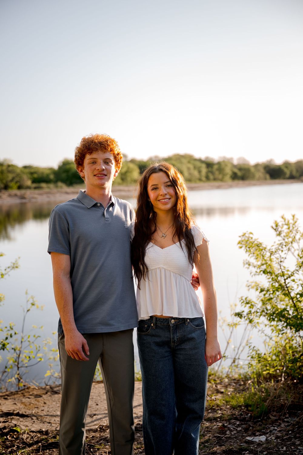 a brother and sister moment during an extended family session in Weatherford on the lake