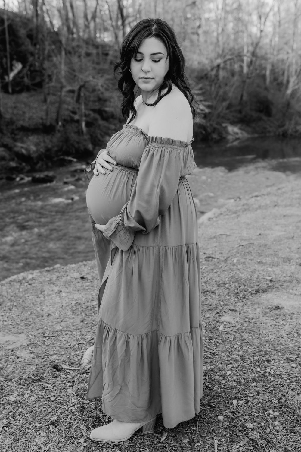 A North Alabama maternity photoshoot at Clarkson Covered Bridge in Cullman, AL. Beautiful maternity gown photos with family