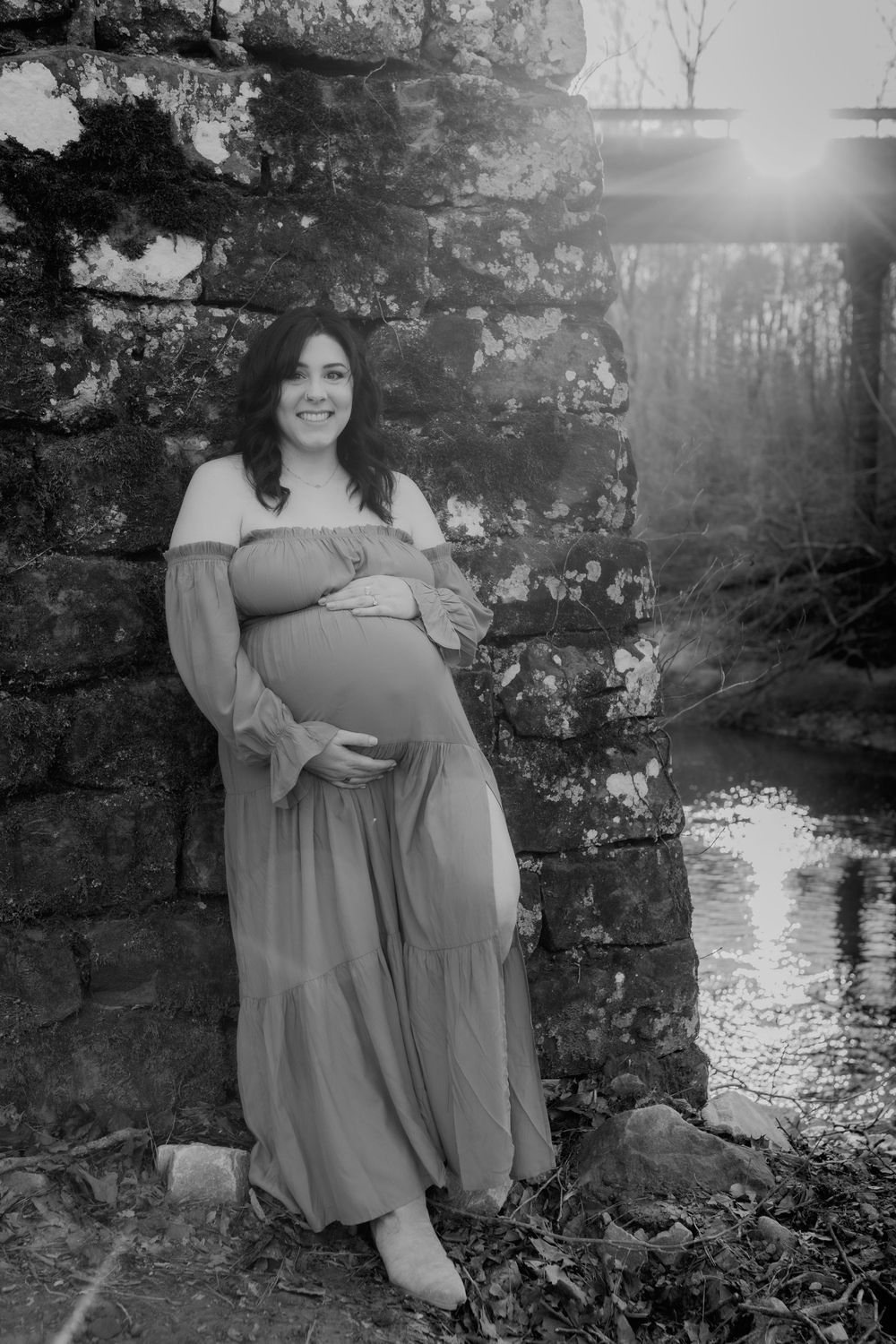 A North Alabama maternity photoshoot at Clarkson Covered Bridge in Cullman, AL. Beautiful maternity gown photos with family