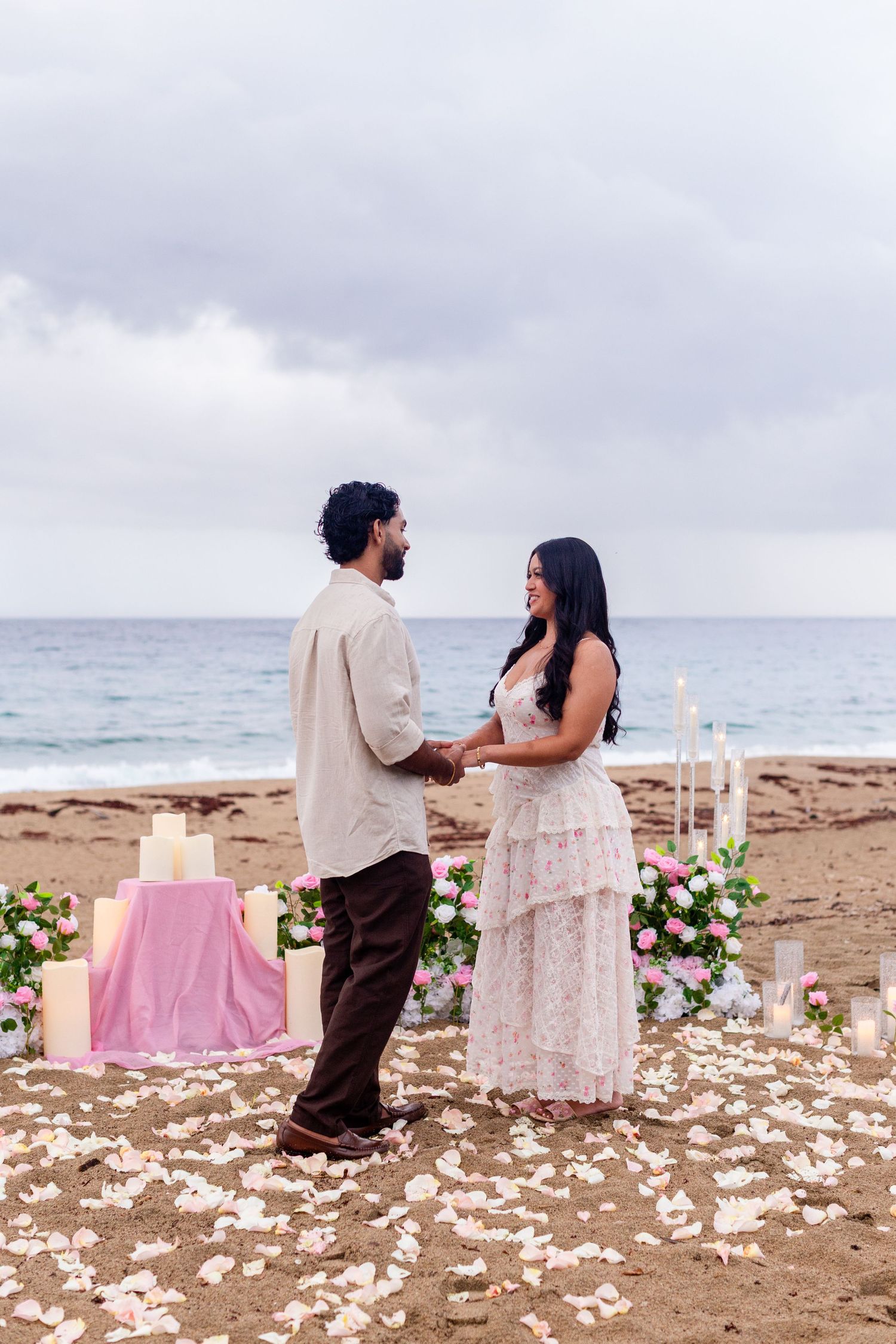 Marriage proposal on the beach with flowers and candles. Playa Guajataca, Isabela, Puerto Rico.