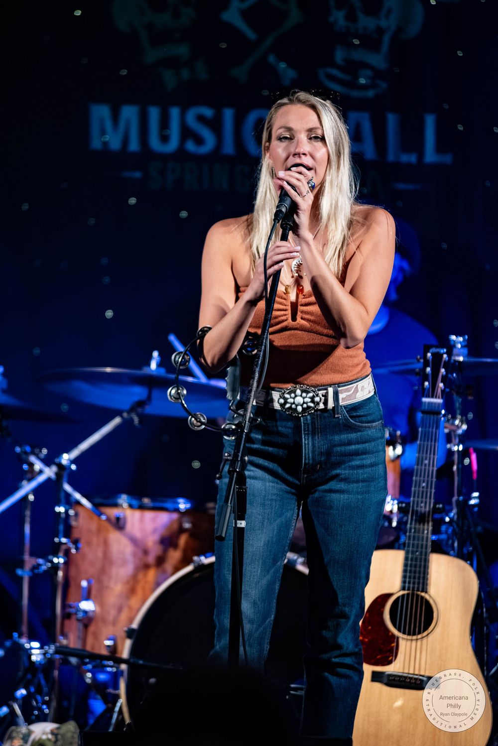 Blonde female singer performing on stage at The Gem Music Hall in Spring City PA.