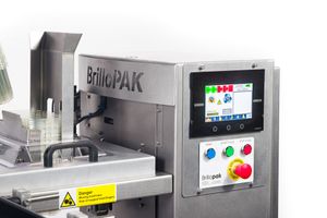 BrilloPAK industrial packaging machine with touchscreen control panel displaying colorful interface icons.