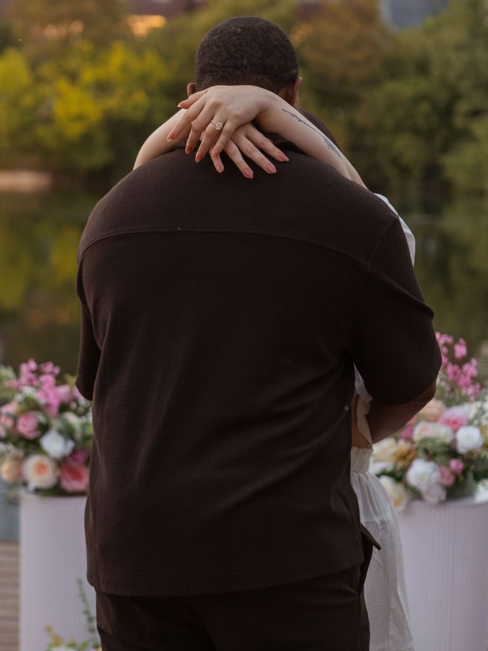Women showing off her new engagment ring at Butler Metro Park.