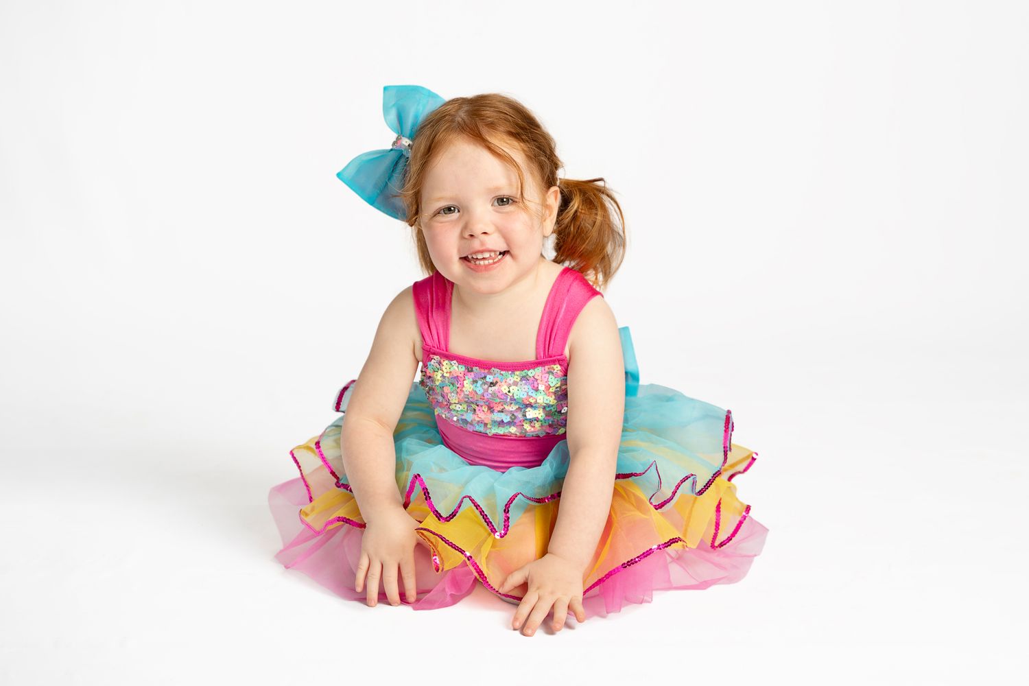 Toddler girl wearing tutu dress at 3M Dance Works in Port Hope posing for individual photo