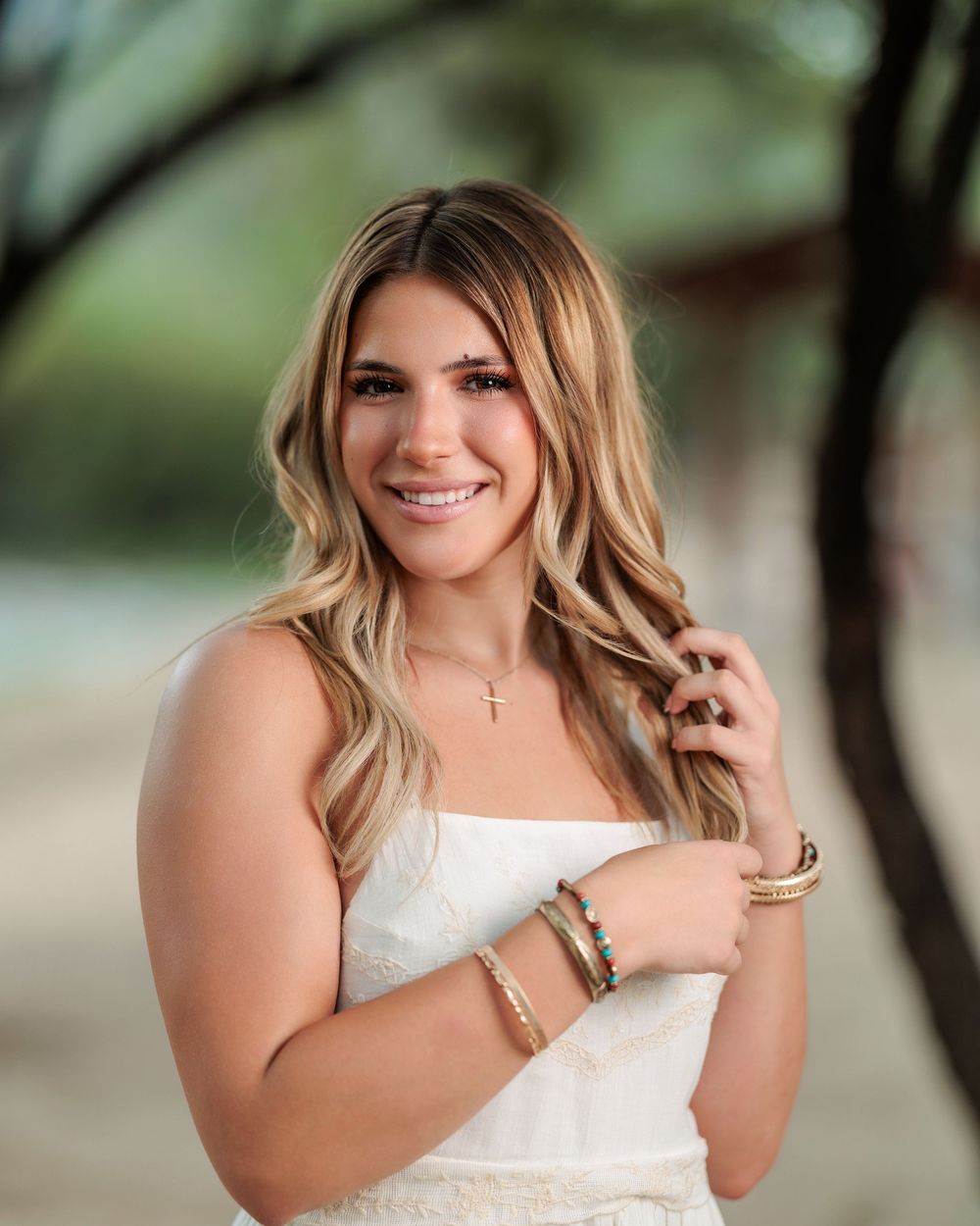 Western Tucson Senior pictures session in the Desert with stormy sky at Tanque Verde Guest Ranch