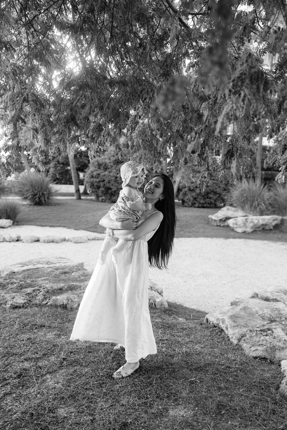Natural, sunset family photos with golden light, a garden, and a toddler. Jacksonville Family Photographer - Lindsay McDow Photo
