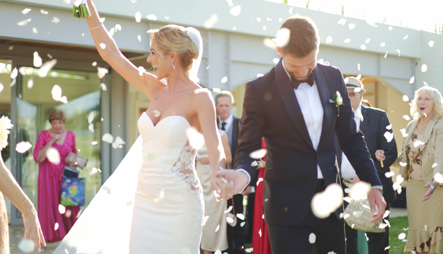 Natural wedding photography capturing an unplanned moment of joy.