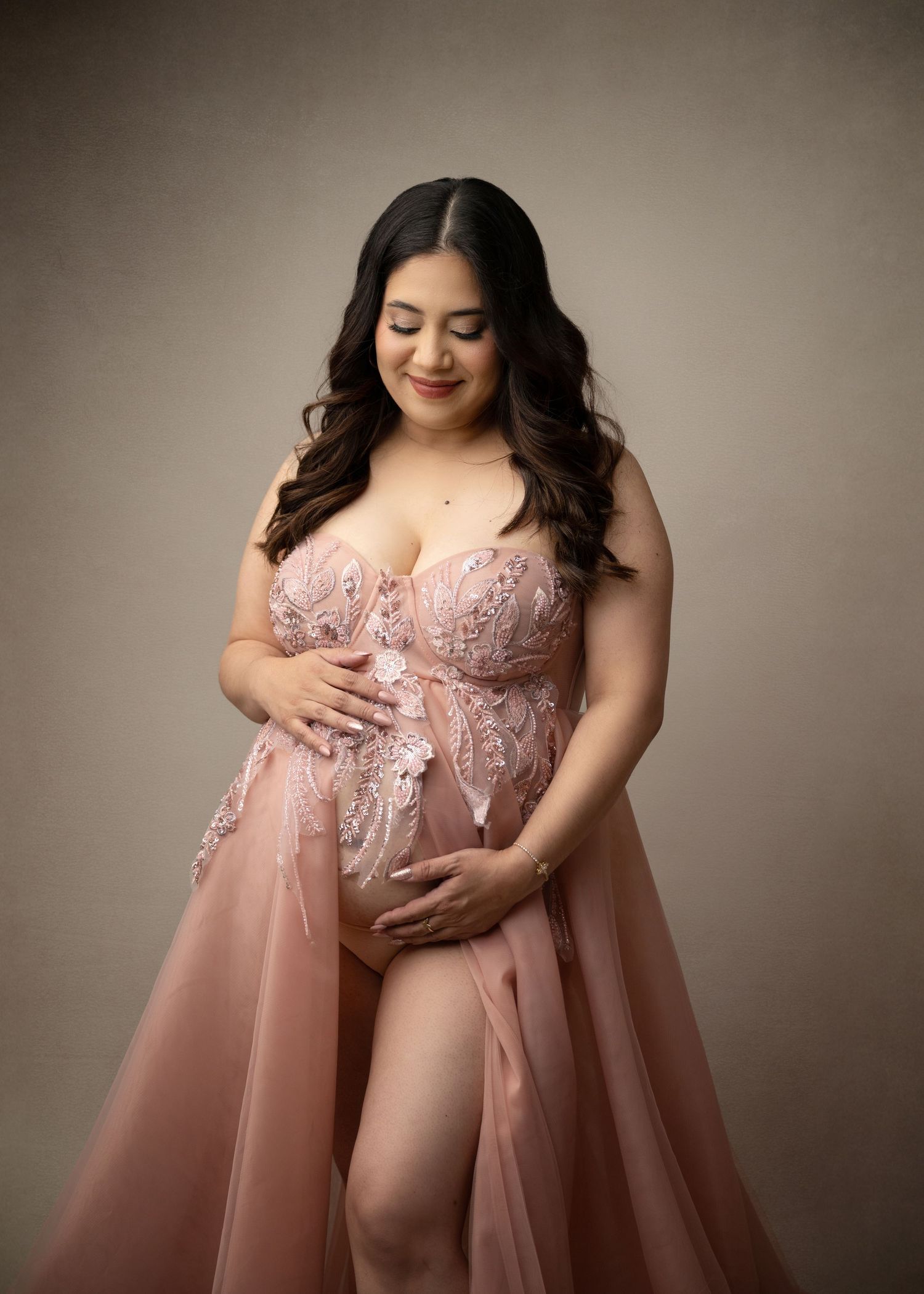 blush maternity dress on a pregnant mother to be in Linden NJ