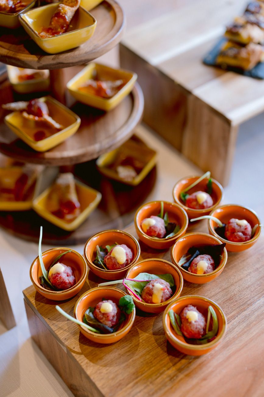 Gourmet finger food and appetizers served during an outdoor rehearsal dinner at a Lake Garda estate