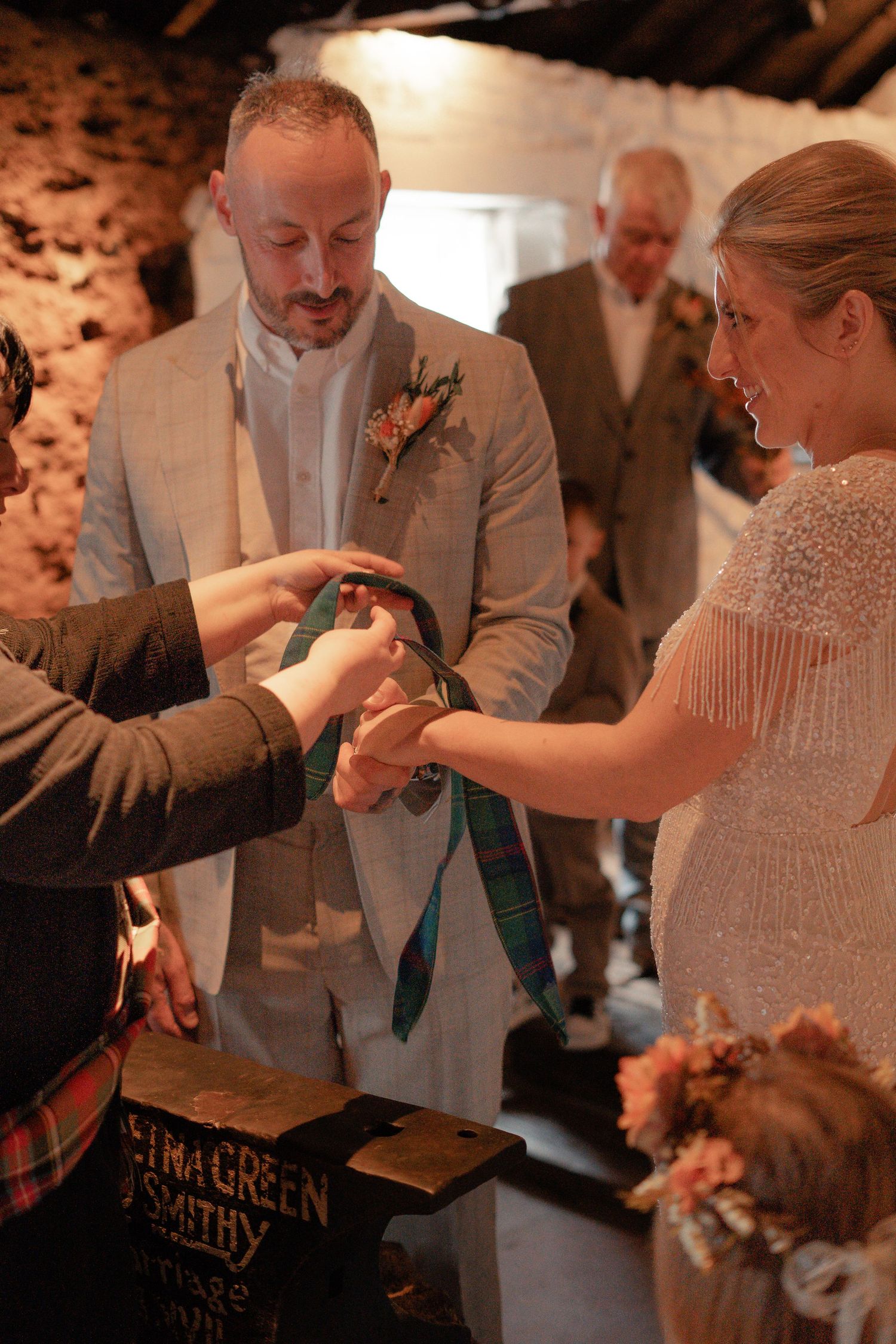 Traditional hand fasting ceremony at Gretna Green, photographed by a Scotland wedding and elopement photographer