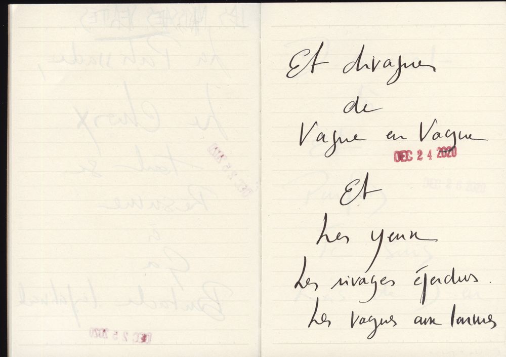 Handwritten French poem in black ink on white paper with elegant cursive script.