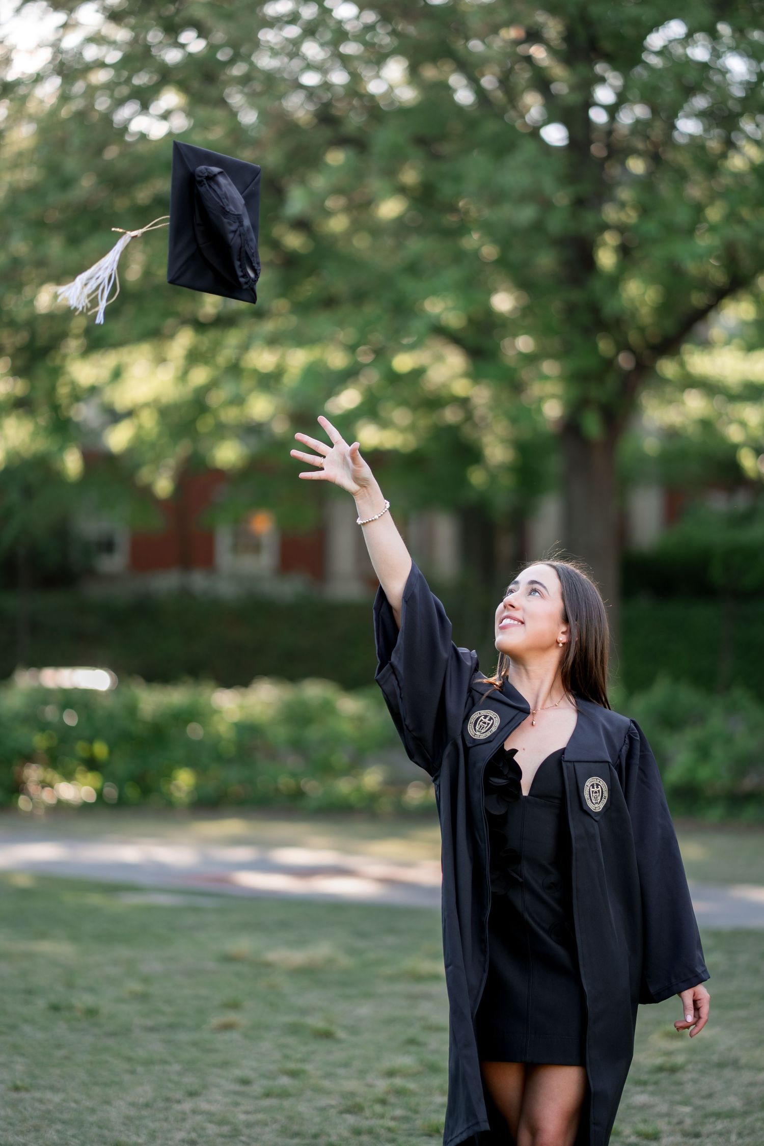 Georgia Tech graduation photos on the lawn in front of tech tower by Atlanta graduation photographer