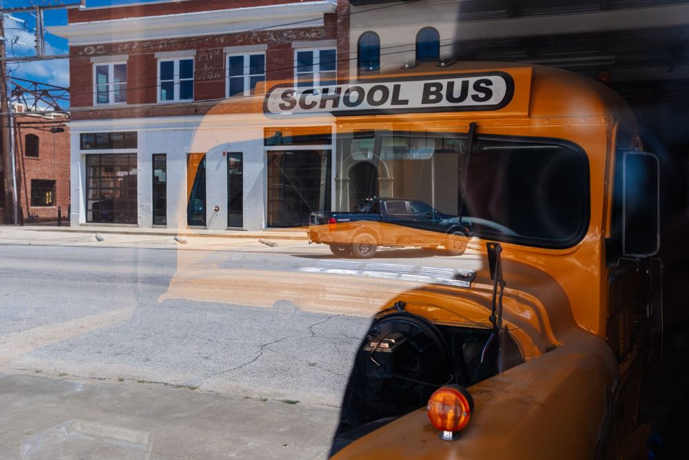 Vintage school bus parked in a garage at Gulf Service Station off Route 66. Sapulpa, OK. June 10, 2026. (David J. Manning)