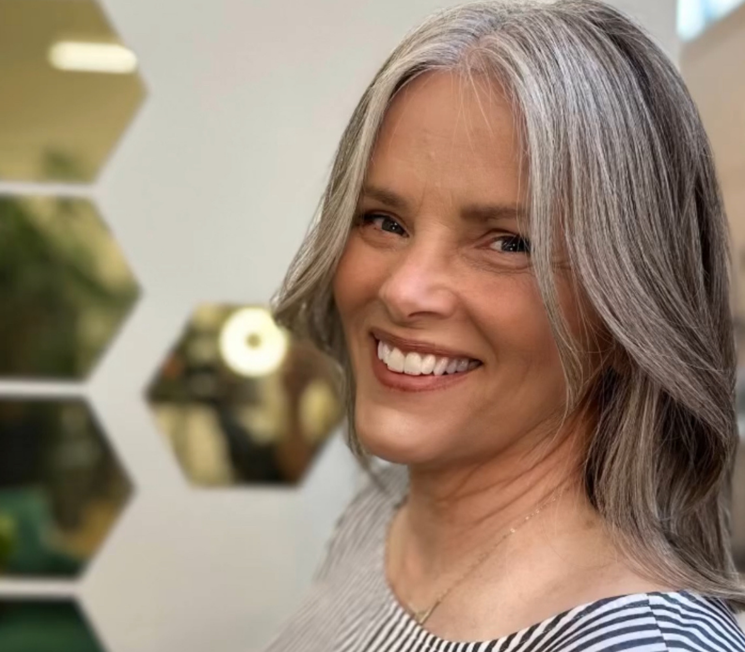 Pamela Hammonds headshot: woman smiling for picture