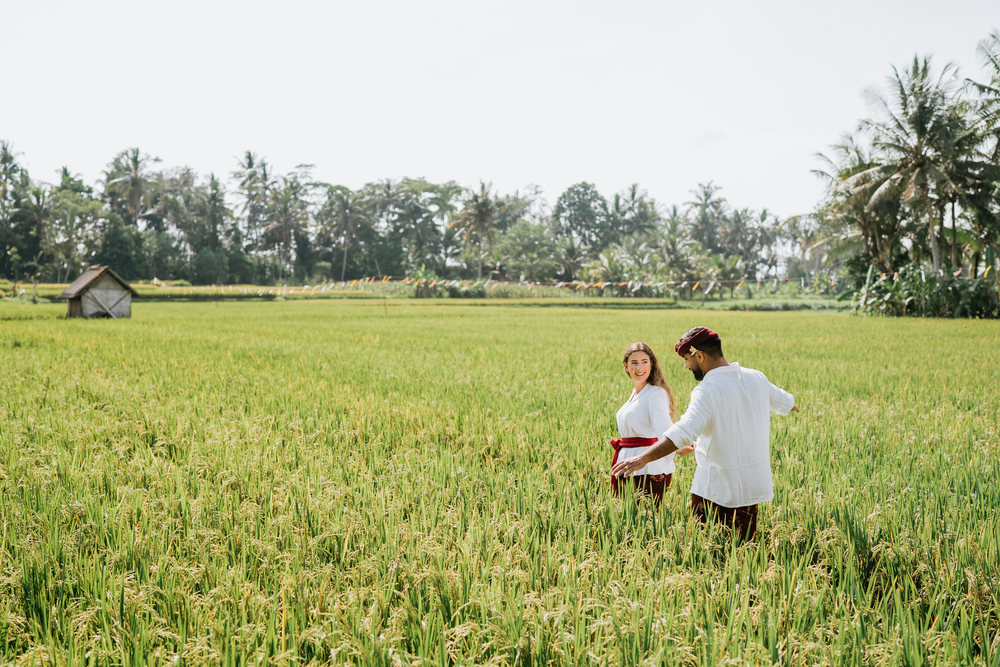 Professional photographer capturing a Balinese costume couple session at The Wakanda.