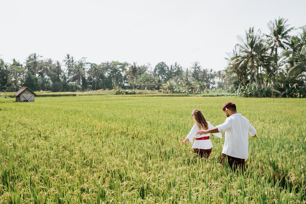 Professional photographer capturing a Balinese costume couple session at The Wakanda.