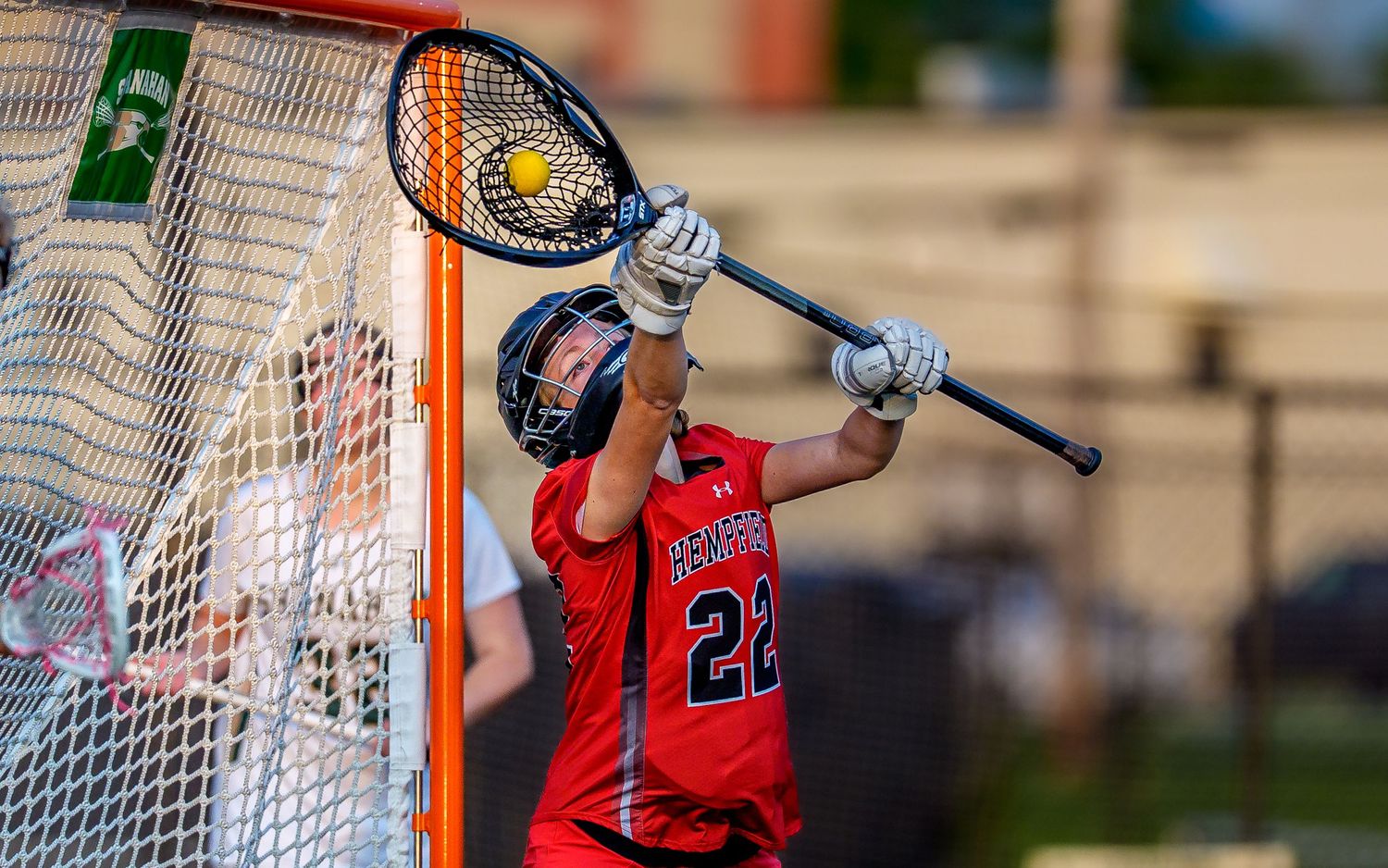 Hempfield girls lacrosse player shooting on goal at the PIAA District Championship, by Deanna Fox, SportsFox Photography based in Hershey PA