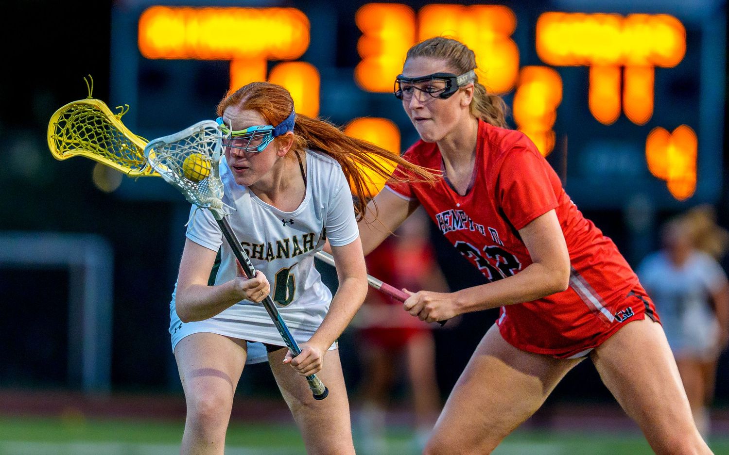 Hempfield girls lacrosse player fighting for the ball at the PIAA District final, by Deanna Fox, SportsFox Photography based in Hershey PA