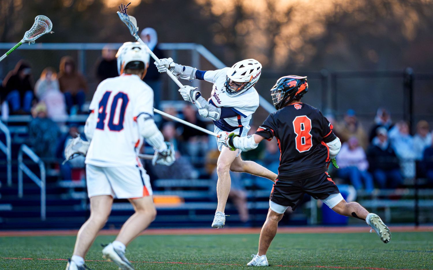 Hershey Trojans boys lacrosse player shooting against Palmyra, by Deanna Fox, SportsFox Photography based in Hershey PA