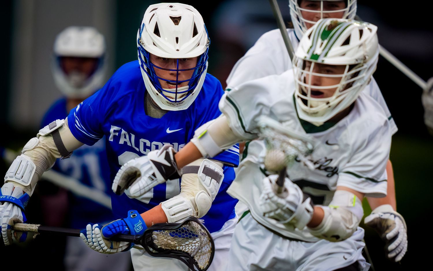 Lower Dauphin lacrosse player battling Twin Valley in the PIAA District semifinal, by Deanna Fox, SportsFox Photography based in Hershey PA