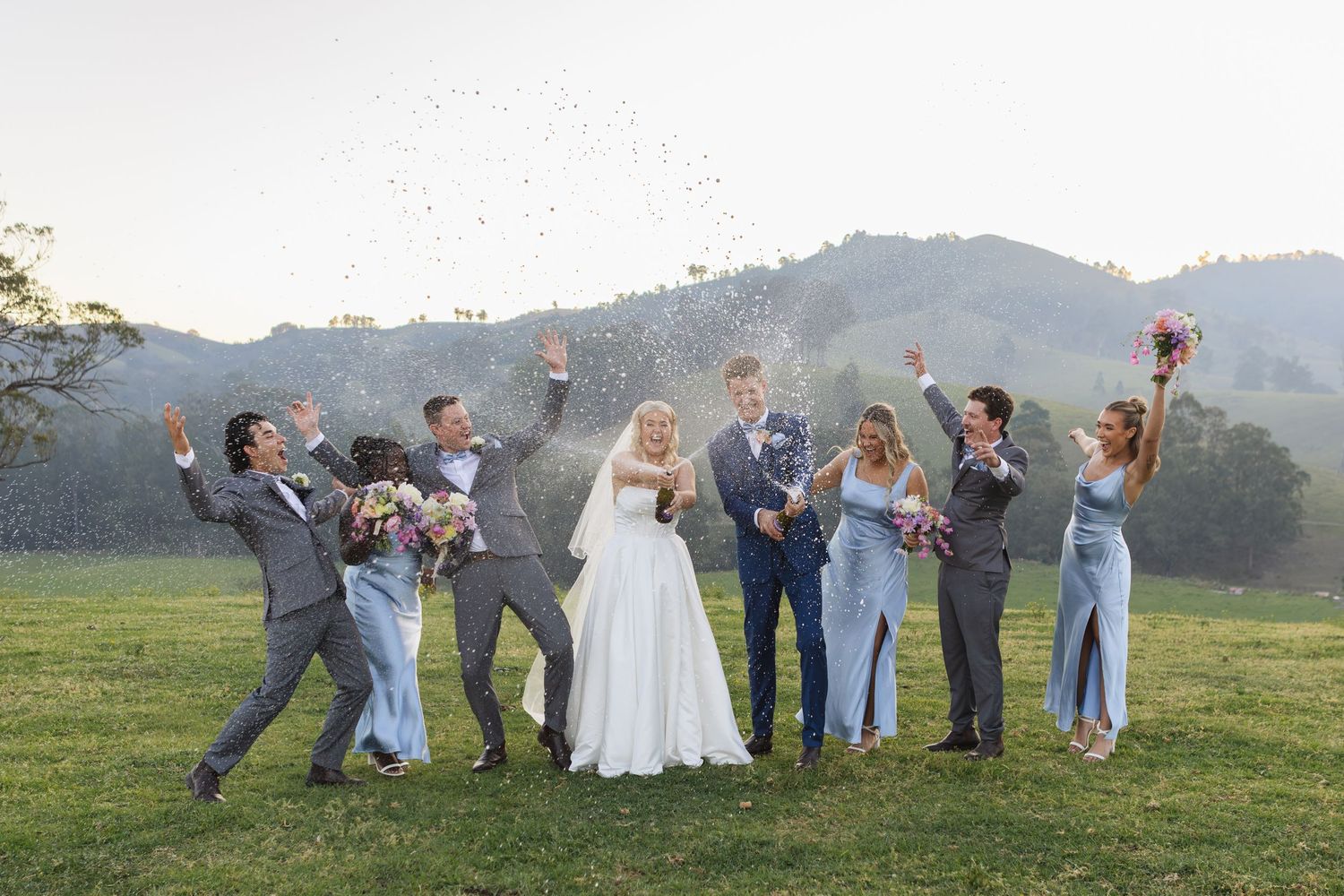 Jess and Lachie during champagne shot at Dungog Weddings in the Hunter Valley NSW