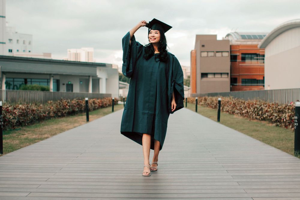 solo portrait graduation shoot for an university graduate at outdoor scenery in singapore