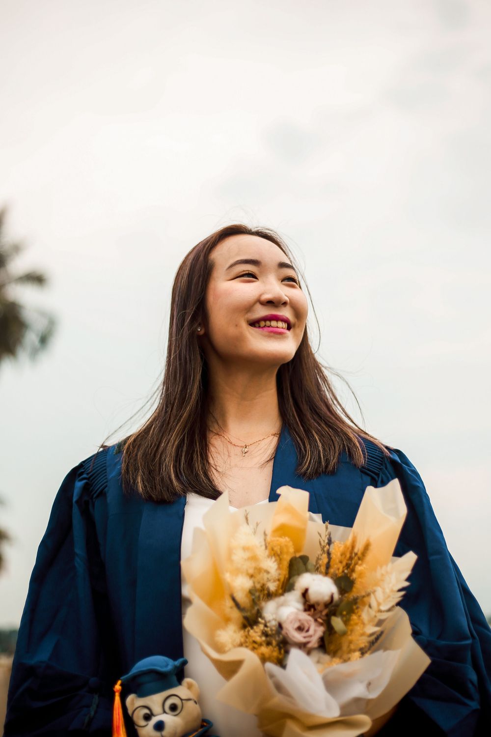 solo portrait graduation shoot for an university graduate at outdoor scenery in singapore