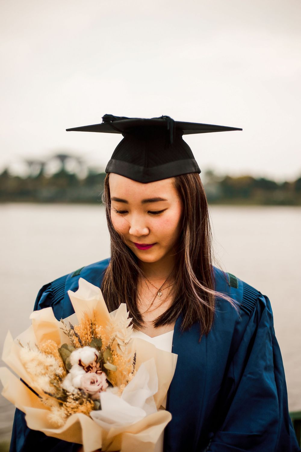 solo portrait graduation shoot for an university graduate at outdoor scenery in singapore