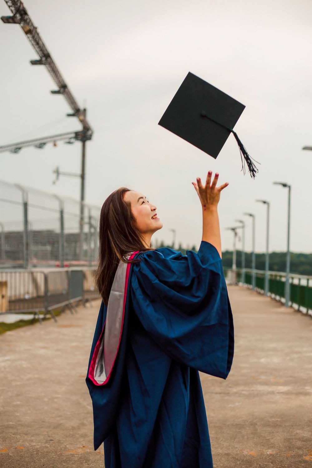 solo portrait graduation shoot for an university graduate at outdoor scenery in singapore