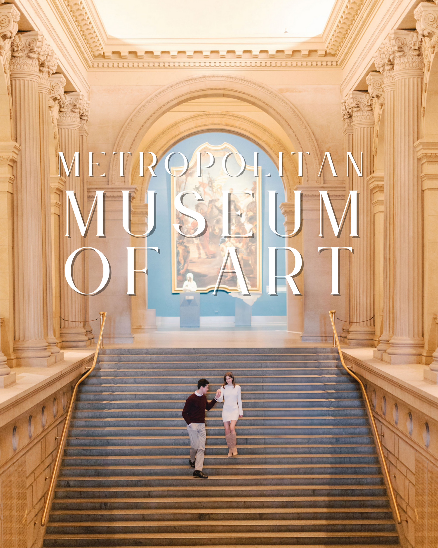 Couple dancing on the grand staircase of the Metropolitan Museum of Art beneath soaring golden columns and arched ceilings.