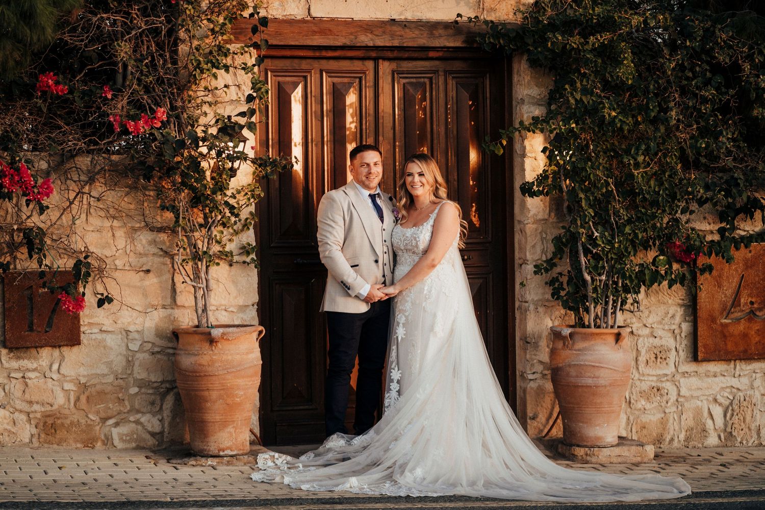 A couple shares their first dance surrounded by magical sparkler fountains at their wedding reception.