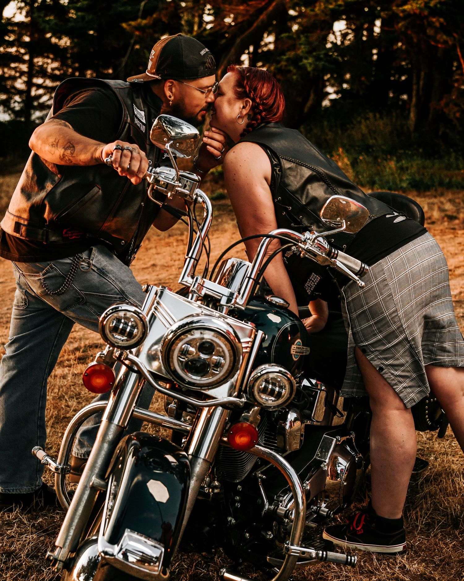 A series of romantic motorcycle engagement photos showing couples posing with a classic cruiser bike at sunset.