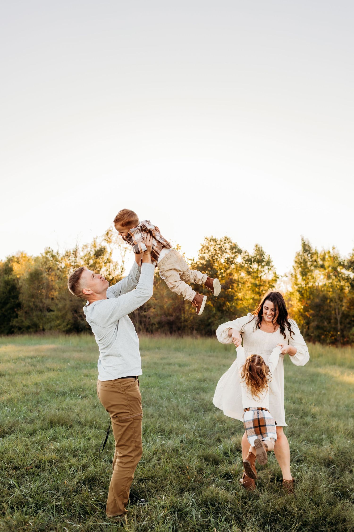 Bridgeport, CT family enjoys precious moments with newborn in a serene woodland setting