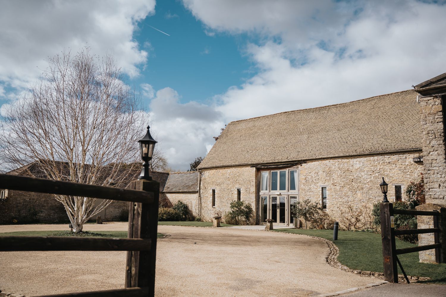 Caswell House wedding venue on a sunny spring day in Witney, Oxfordshire.