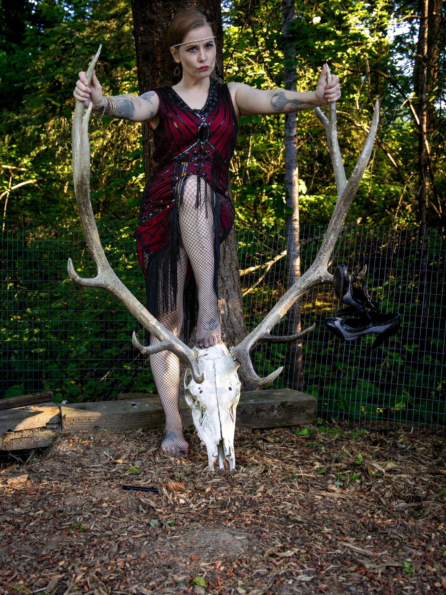 Bree Posing with a 1920s flapper dress with a El skull and horns