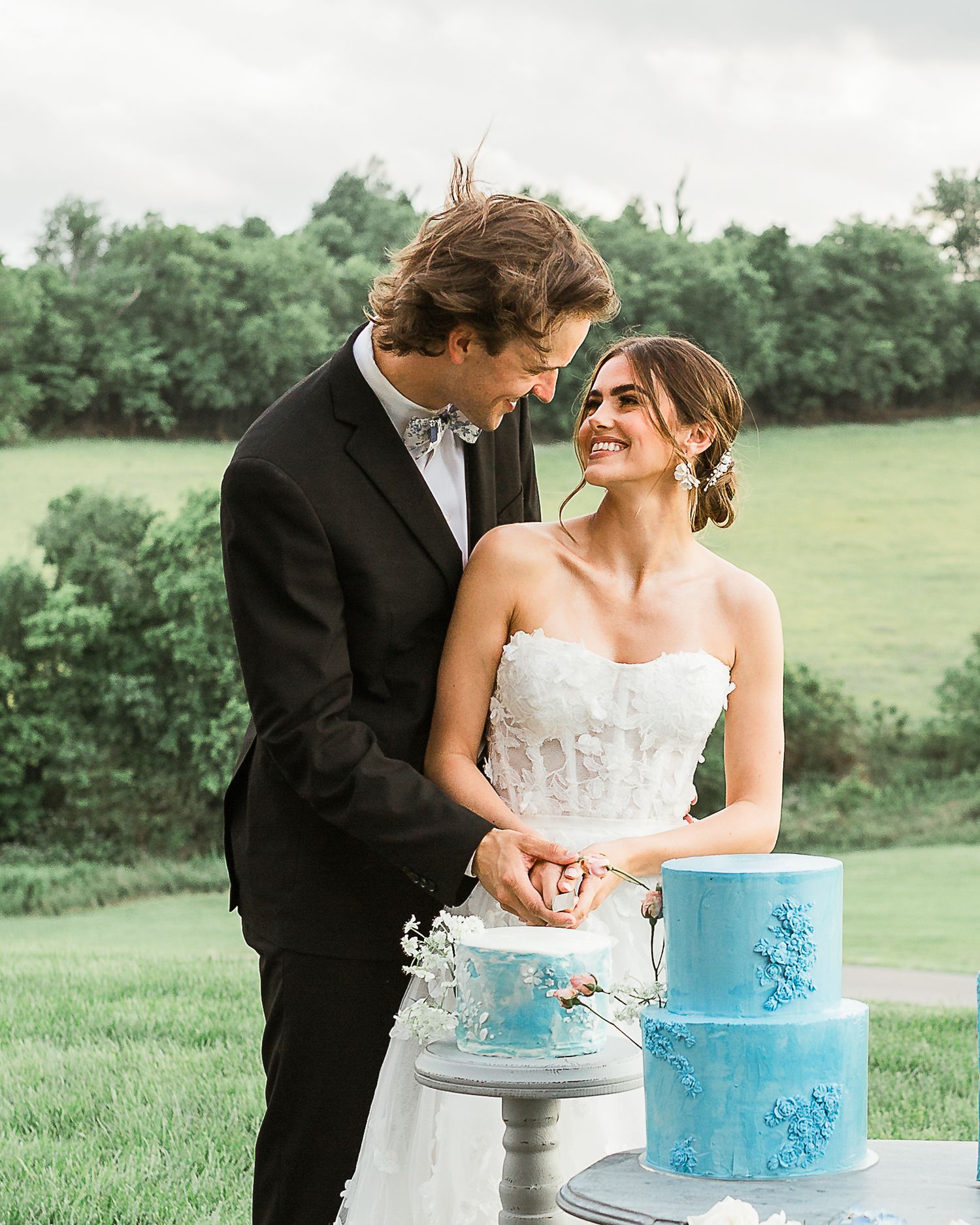 Wedding cakes don't always have to be white.  This couple made their cake their something blue at this gorgeous outdoor Nashville wedding.