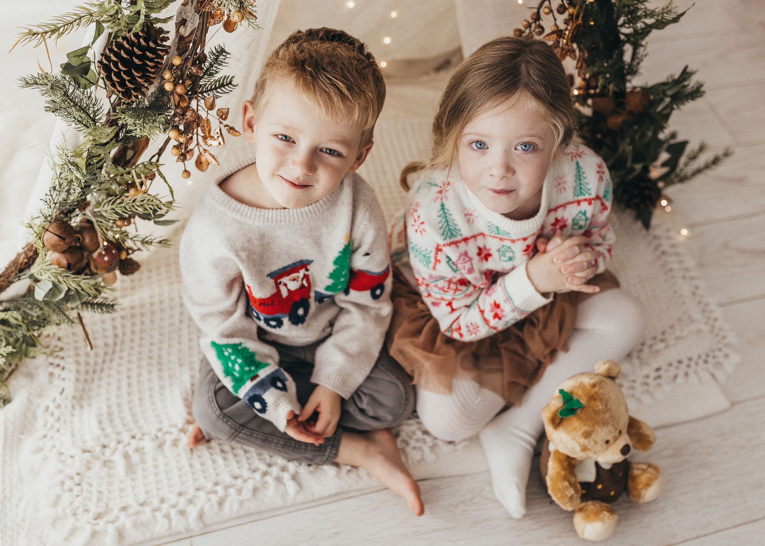 scandinavian vintage style warm christmas photo of two children