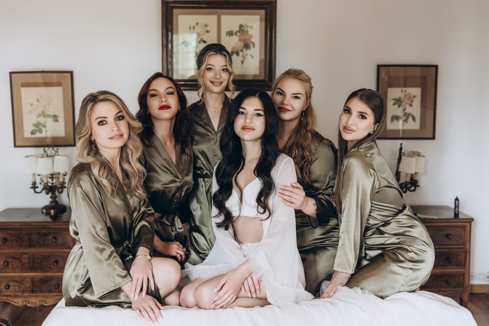 Group portrait during getting ready at wedding at La Baronia in Spain