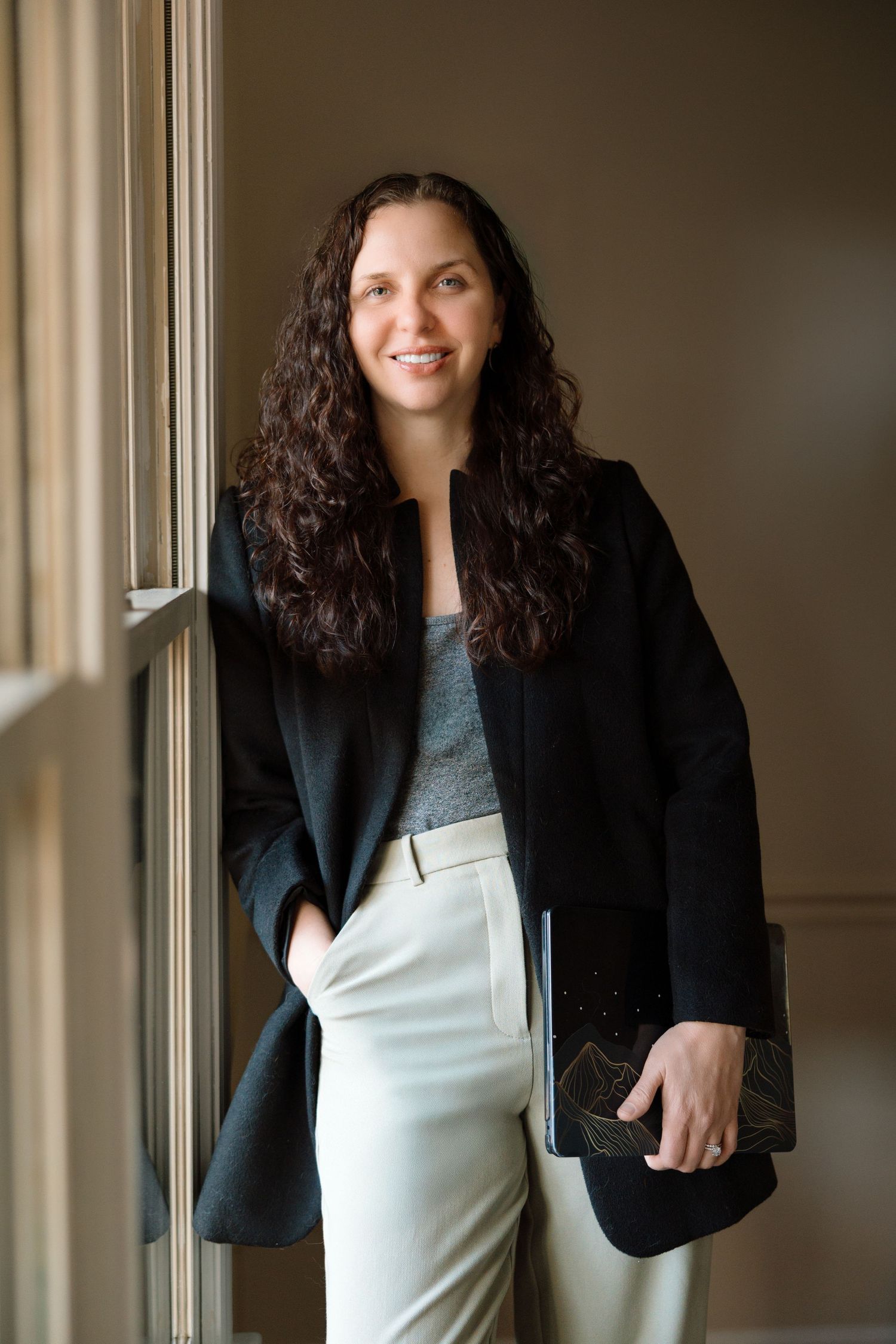LGBTQ Asheville small business entrepreneur and local realtor posing during a personal and professional branding photography session