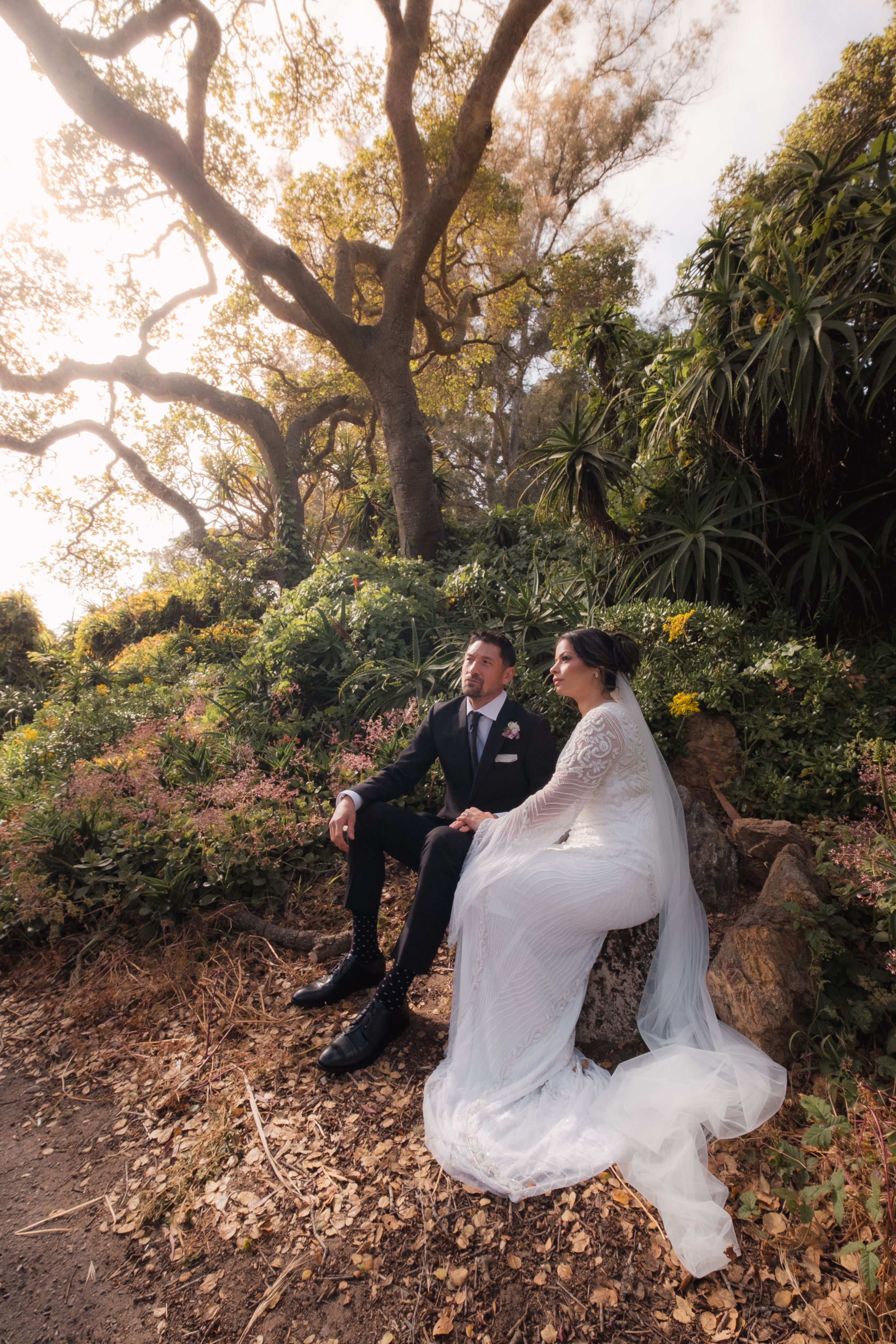 Couple during a post wedding photo shoot at the conservatory of flowers.