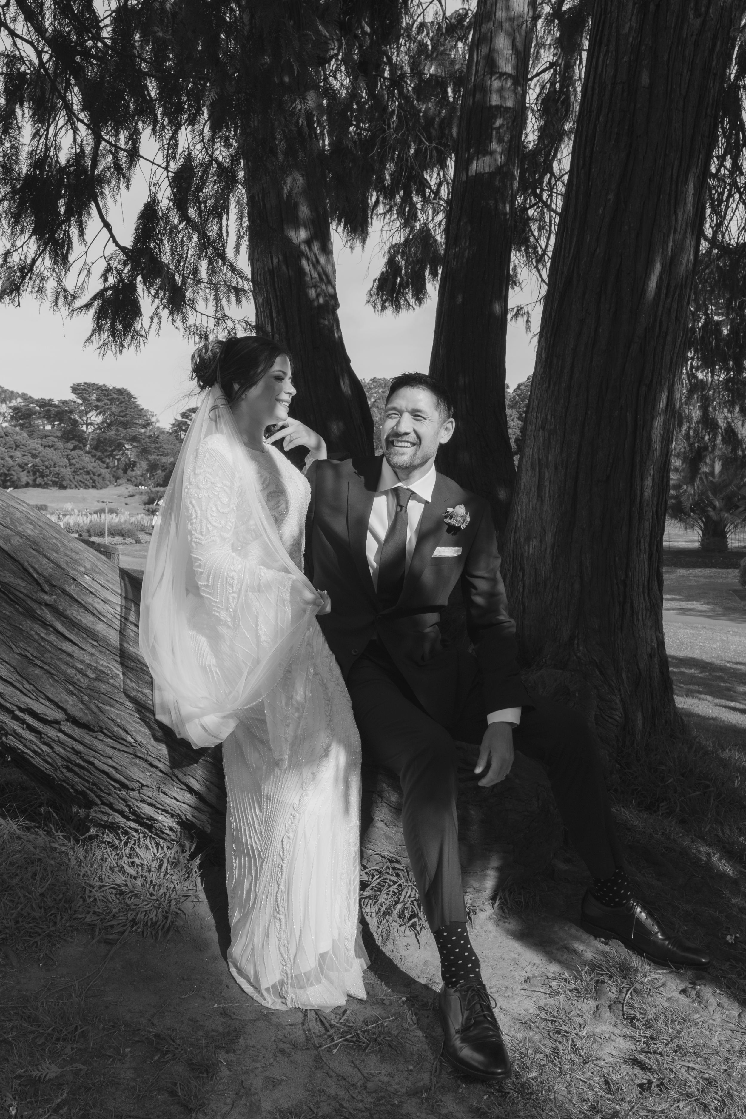 Couple during a post wedding photo shoot at the conservatory of flowers.