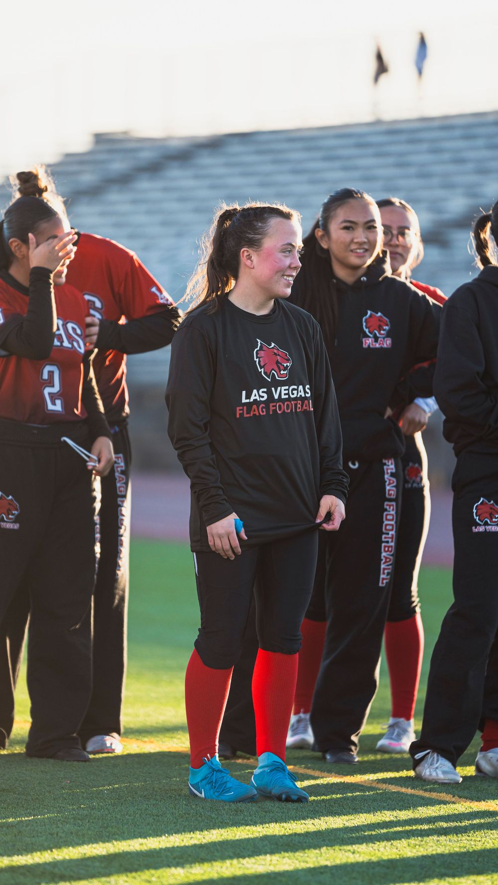 Girls flag football player looking off right screen