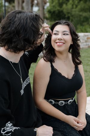 Series of candid moments between a couple dressed in black outdoors.