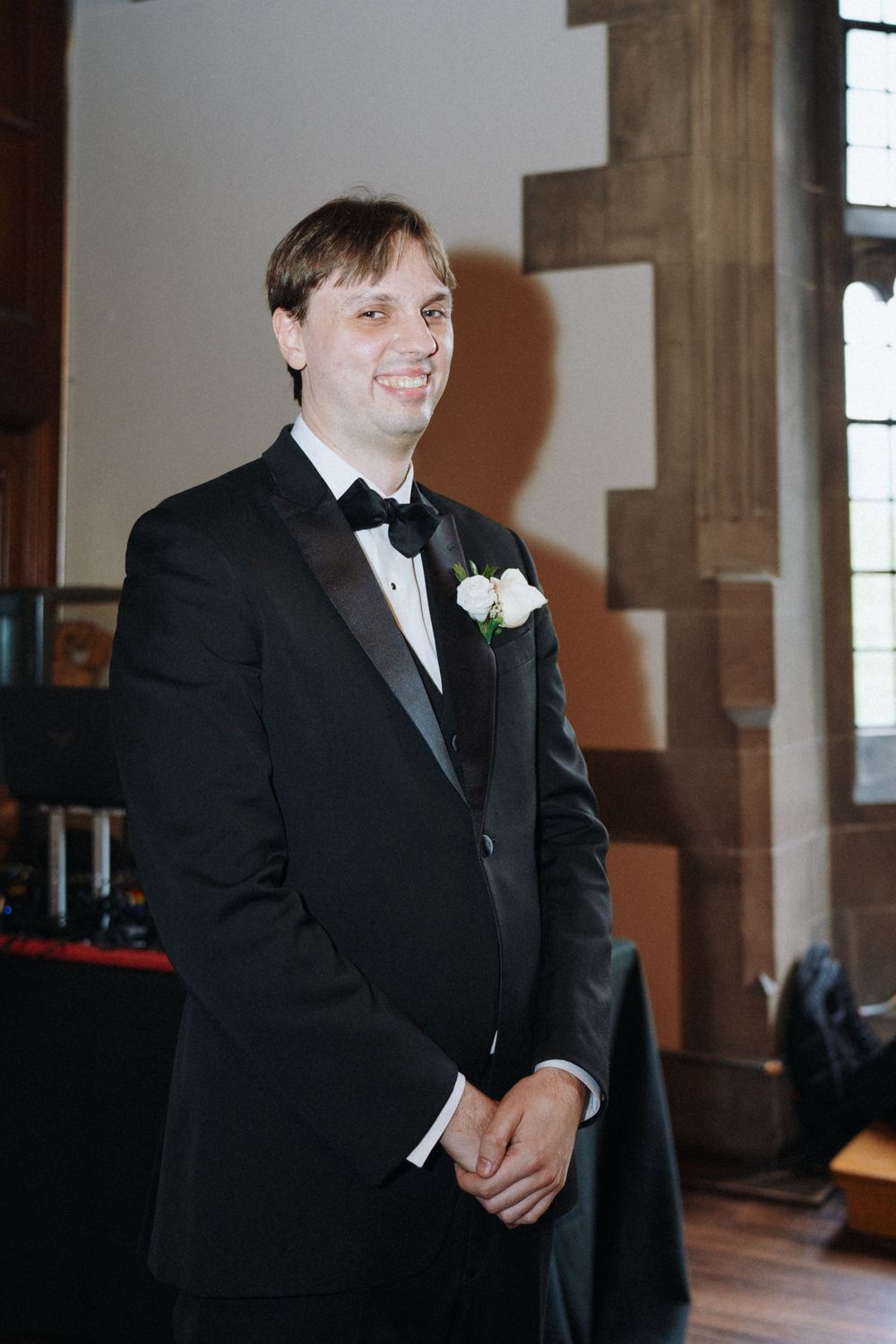 Elegant indoor wedding photography at Hart House in Toronto, capturing romantic moments.
