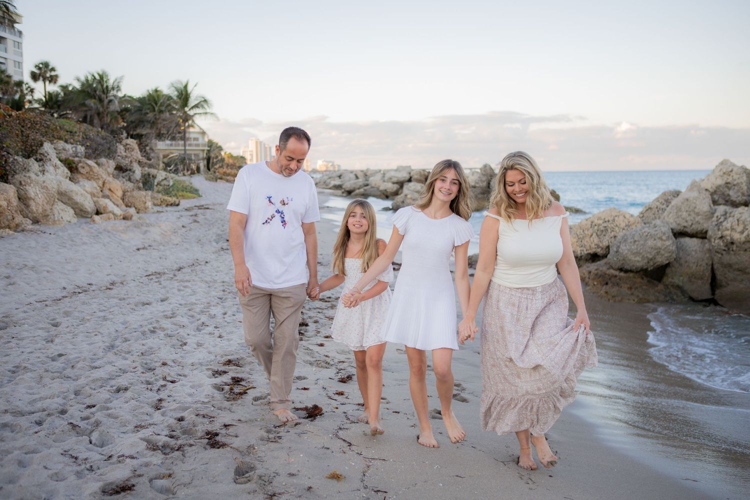 Gorgeous sunset family picture in Deerfield Beach Florida, taken by Wanderlust Studios